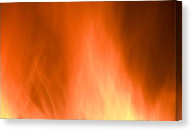 Flames Background Canvas Print featuring the photograph Fire flames abstract background by Michalakis Ppalis