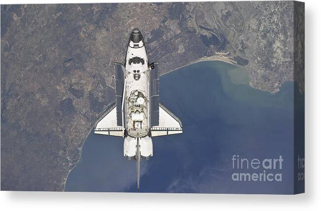 Sts-132 Canvas Print featuring the photograph Flying Above The Atlantic Coast by Stocktrek Images