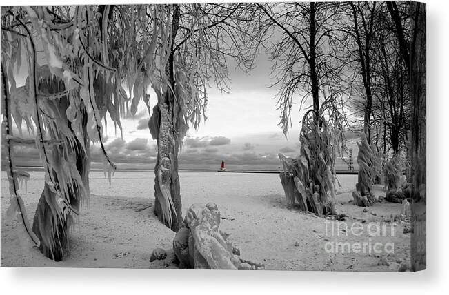 Lighthouse Ann Arbor Park Canvas Print featuring the photograph Frozen Landscape of the Menominee North Pier Lighthouse by Mark J Seefeldt