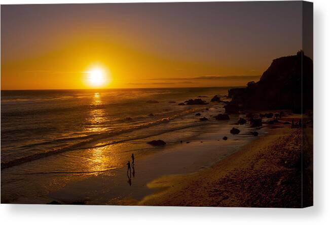 Golden Sunset Walk Malibu Beach California Canvas Print featuring the photograph Golden Sunset Walk On Malibu Beach by Jerry Cowart