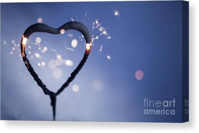 Heart Canvas Print featuring the photograph Heart shape sparkler by Kati Finell