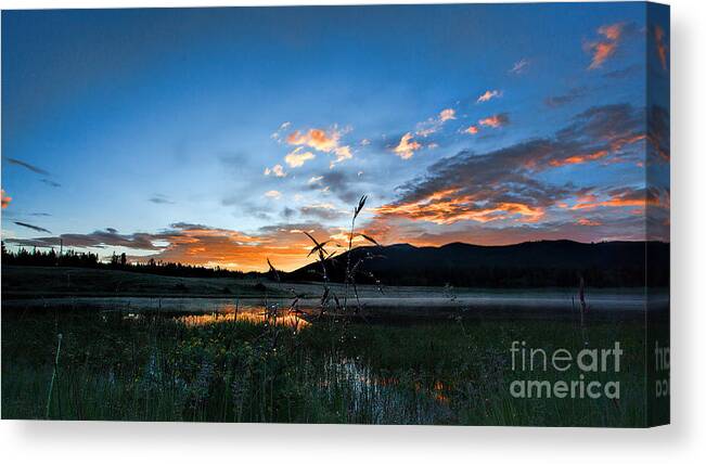 Sunrise Canvas Print featuring the photograph Night's Retrteat by Jim Garrison