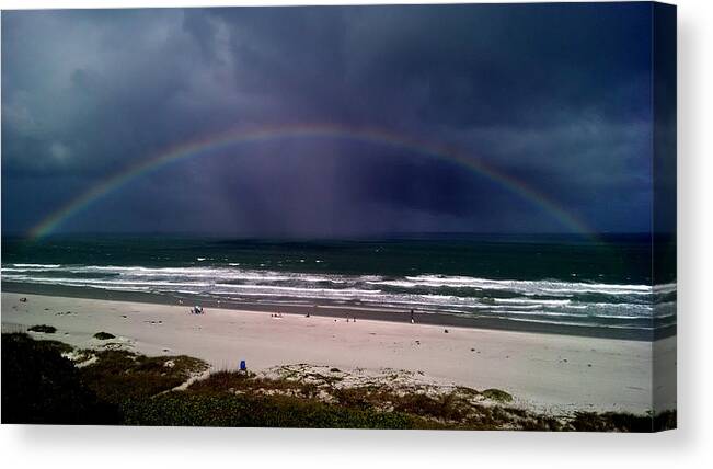 Rainbow Canvas Print featuring the photograph Rainbow Near The Shore by David Weeks