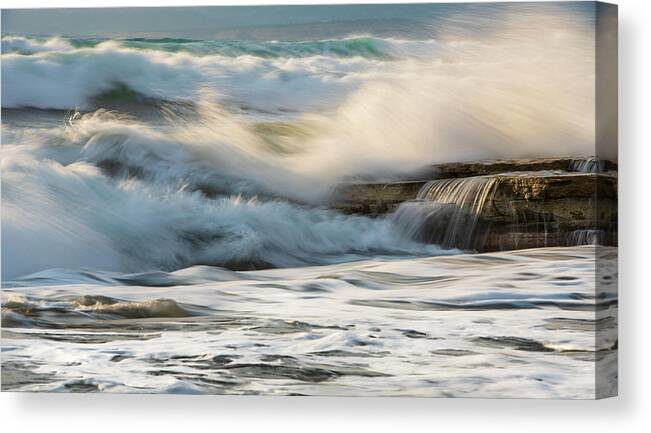 Sea Waves Canvas Print featuring the photograph Rocky seashore, wavy ocean and wind waves crashing on the rocks by Michalakis Ppalis
