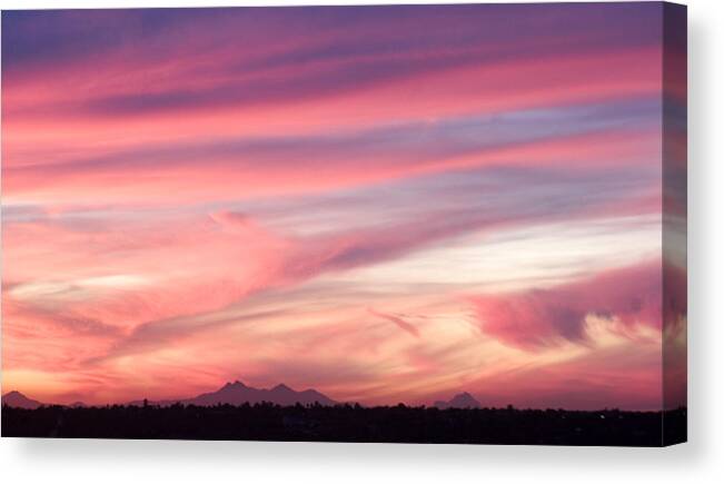 Sunset Canvas Print featuring the photograph Sunset Colored Clouds by Elvira Butler