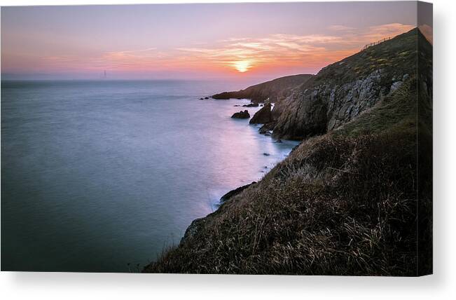 Cliff Canvas Print featuring the photograph Sunset in Howth Cliff path - Dublin, Ireland - Seascape photography by Giuseppe Milo