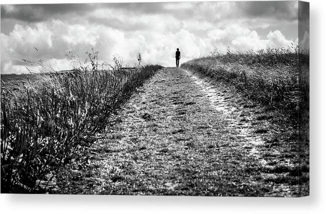 Black Canvas Print featuring the photograph The cowboy - West Kennet, United Kingdom - Black and white street photography by Giuseppe Milo