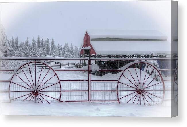 Wagon Wheels Canvas Print featuring the photograph Wagon Wheel Ranch by Kristy Brown