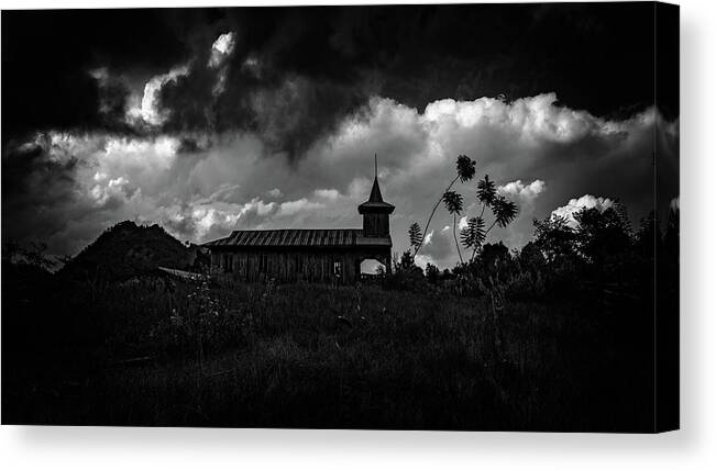 Church Canvas Print featuring the photograph Ancient Wooden Church With Storm Clouds by Chris Lord