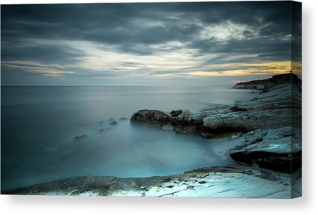 Seashore Canvas Print featuring the photograph Calmness of the sea by Michalakis Ppalis