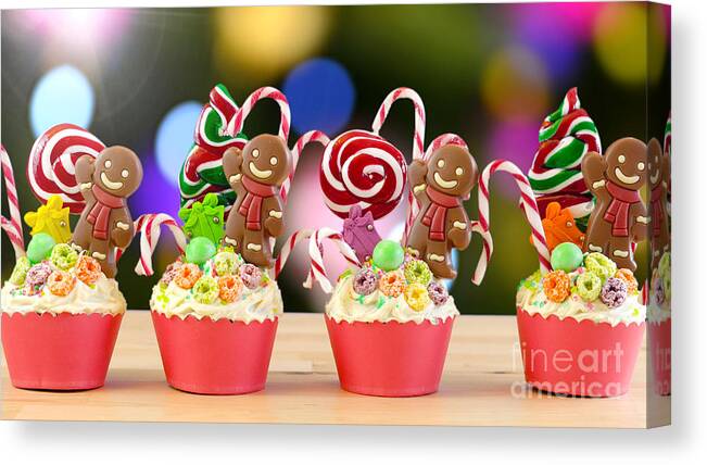 Christmas Canvas Print featuring the photograph Candyland festive Christmas cupcakes. by Milleflore Images