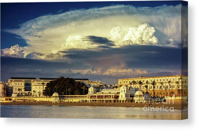 Famous Canvas Print featuring the photograph Cloudy Sky over La Caleta Spa Cadiz by Pablo Avanzini