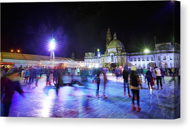 People Canvas Print featuring the photograph Ice Rink With Cardiff City Hall by Allan Baxter