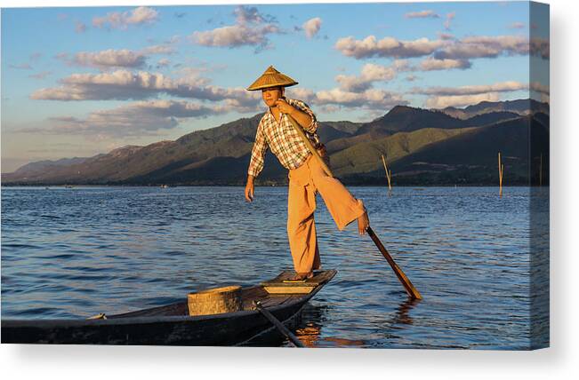 Fisherman Canvas Print featuring the photograph Intha fisherman on Lake Inle in Myanmar by Ann Moore