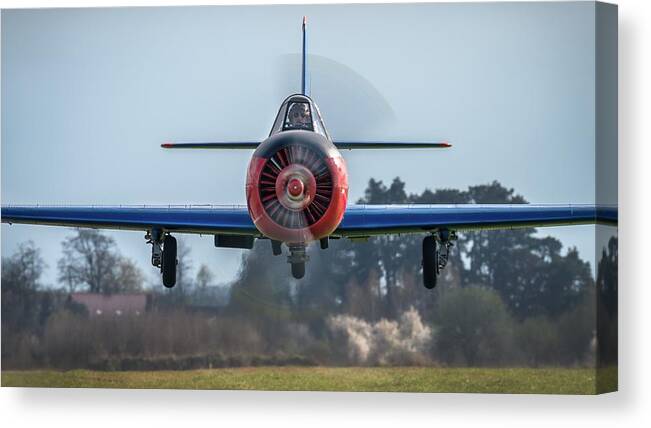 Speed Canvas Print featuring the photograph Low-pass Yak-52 by Piotr Wrobel