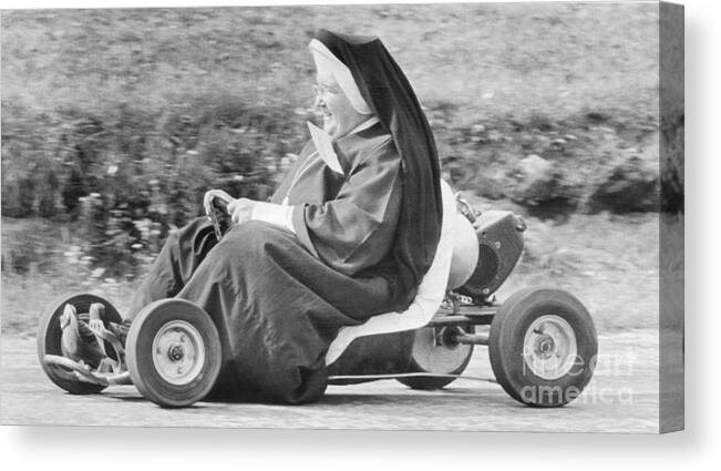 Wind Canvas Print featuring the photograph Nun Races Go-cart by Bettmann