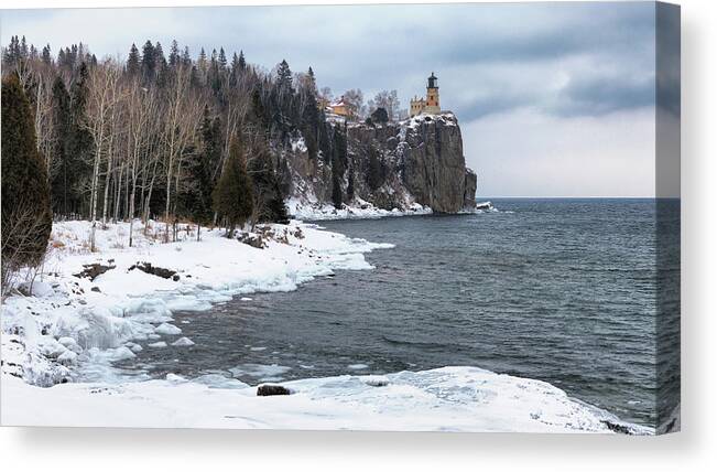 Lighthouse Canvas Print featuring the photograph Snowy Split Rock Lighthouse by Susan Rissi Tregoning