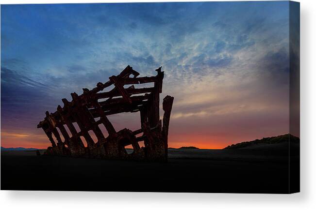 The Wreck Of The Peter Iredale Canvas Print featuring the photograph The Wreck of the Peter Iredale III by John Poon