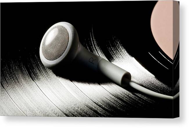 Music Canvas Print featuring the photograph Vinyl Record With Mp3 Player Headphones by Ian Moran