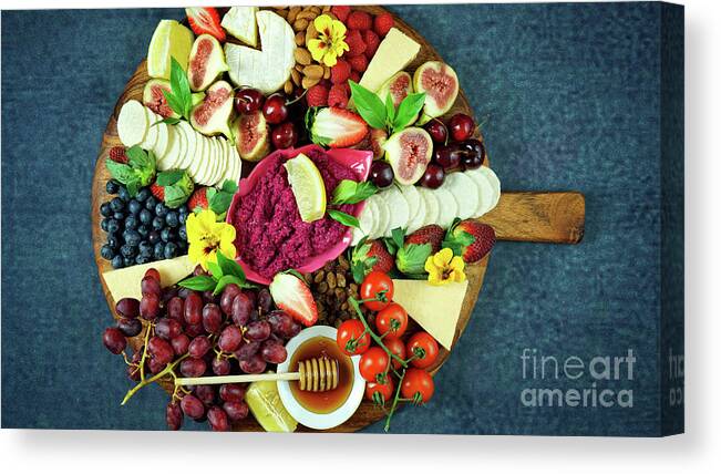 Food Canvas Print featuring the photograph Cheese and fruit charcuterie dessert grazing platter on wooden board. #1 by Milleflore Images