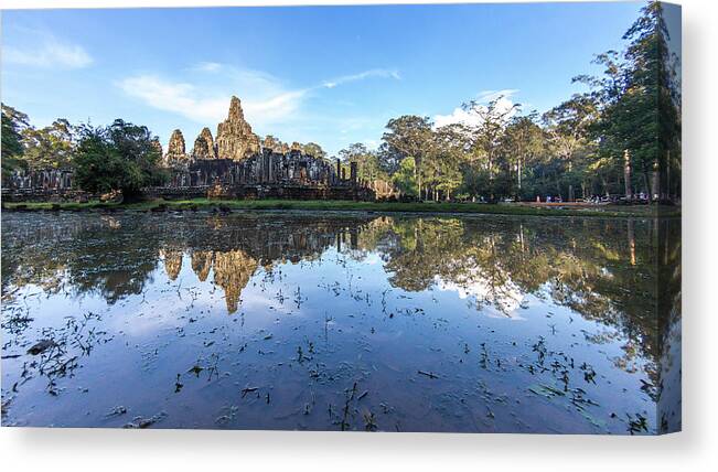 Reflection Canvas Print featuring the photograph Angkor Wat temple by Stelios Kleanthous