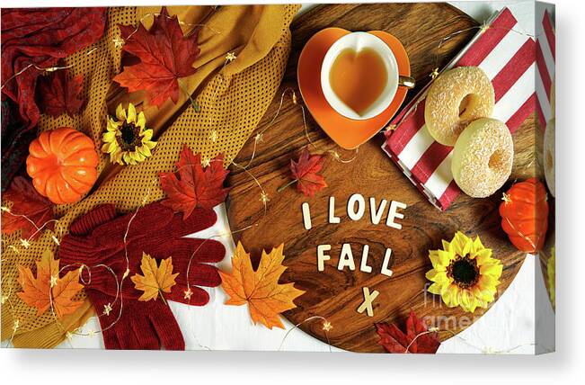 Autumn Canvas Print featuring the photograph Autumn Fall theme flatlay with cozy sweater, bagels and cups of herbal tea. by Milleflore Images