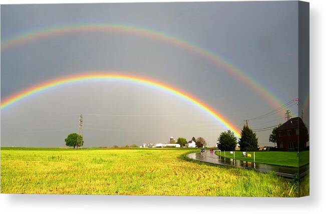 Rainbow Canvas Print featuring the photograph Double Rainbow by Jeanette Oberholtzer