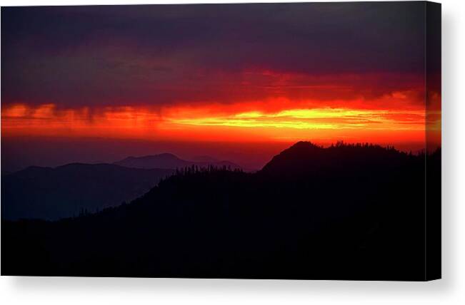 Sunset Canvas Print featuring the photograph Evening Glow by Brett Harvey
