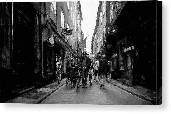 Photography Canvas Print featuring the photograph Moving On The Narrow Streets Of Stockholm by Aleksandrs Drozdovs