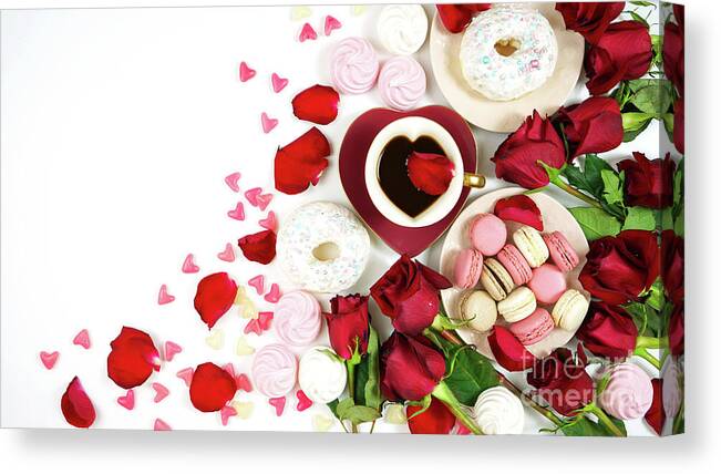 Red roses, petals, lollipops and chocolates creative composition