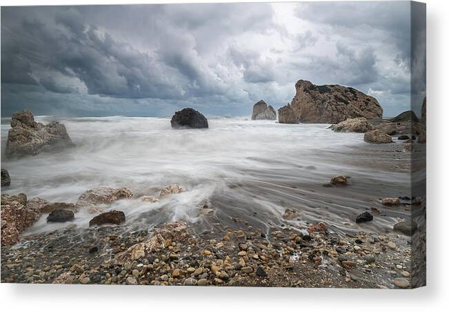 Seascape Canvas Print featuring the photograph Seascape with windy waves during storm weather at the a rocky co by Michalakis Ppalis