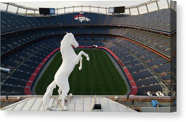 Denver Colorado Canvas Print featuring the photograph View of Denver Bronco overlooking Mile High Stadium by Eldon McGraw