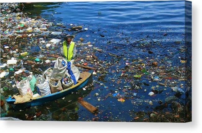 Trash Canvas Print featuring the photograph Washed-up trash collection by Robert Bociaga