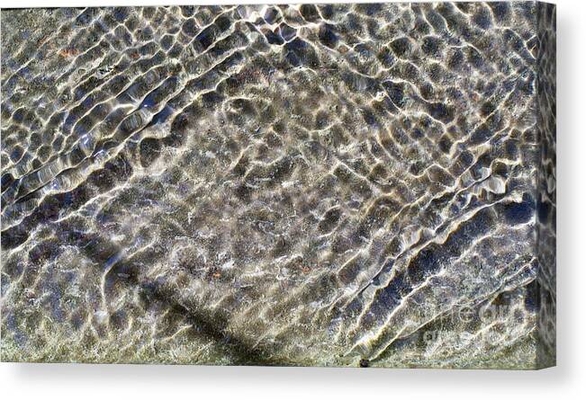 Wave Canvas Print featuring the photograph Wavelets of water by Bryan Attewell