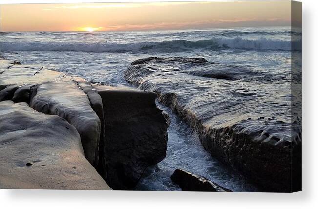 Tranquility Canvas Print featuring the photograph Waves on rocks at sunset by Shabnam Mozafari / FOAP