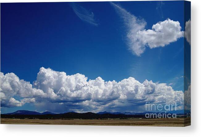 Clouds Canvas Print featuring the photograph Wondrous Clouds by Kae Cheatham