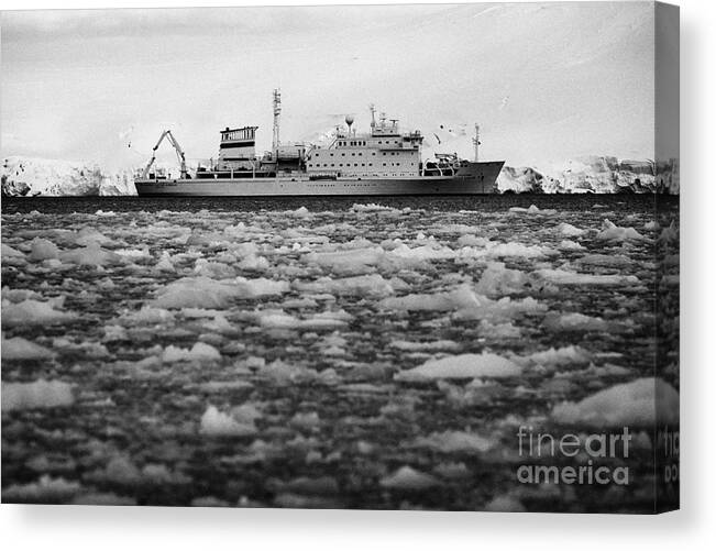 Brash Canvas Print featuring the photograph Akademik Sergey Vavilov Russian Research Ship In Port Lockroy As Brash Sea Ice Forming Winter Closin #1 by Joe Fox