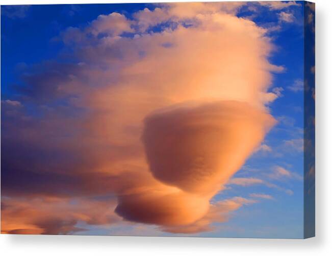 Lenticular Clouds Canvas Print featuring the photograph Sunset Clouds by Donna Kennedy