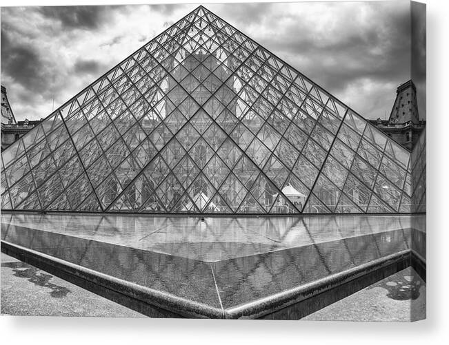 Louvre Museum Canvas Print featuring the photograph The Old Through the New by Georgia Clare