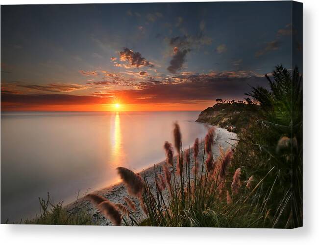 Sunset Canvas Print featuring the photograph Sunset at Swamis Beach 2 by Larry Marshall