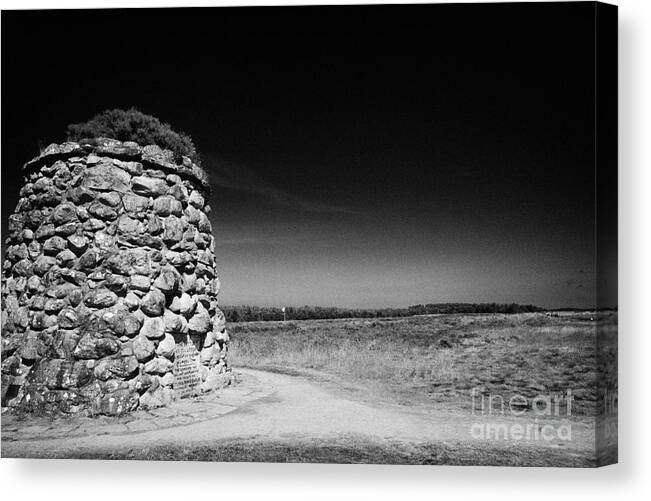 The Canvas Print featuring the photograph the memorial cairn on Culloden moor battlefield site highlands scotland #3 by Joe Fox