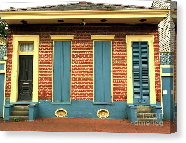 Brick Row House In New Orleans Canvas Print featuring the photograph Brick Row House in New Orleans by John Rizzuto