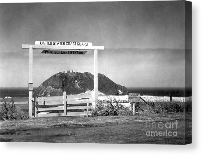 Looking Through The Gate Of The Canvas Print featuring the photograph Looking through the gate of the Point Sur Light Station from Hig by Monterey County Historical Society