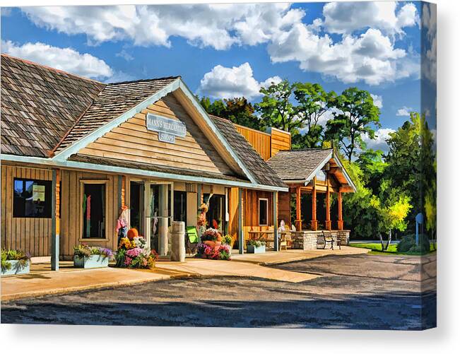 Door County Canvas Print featuring the painting Mann's Mercantile Shops on Washington Island Door County by Christopher Arndt