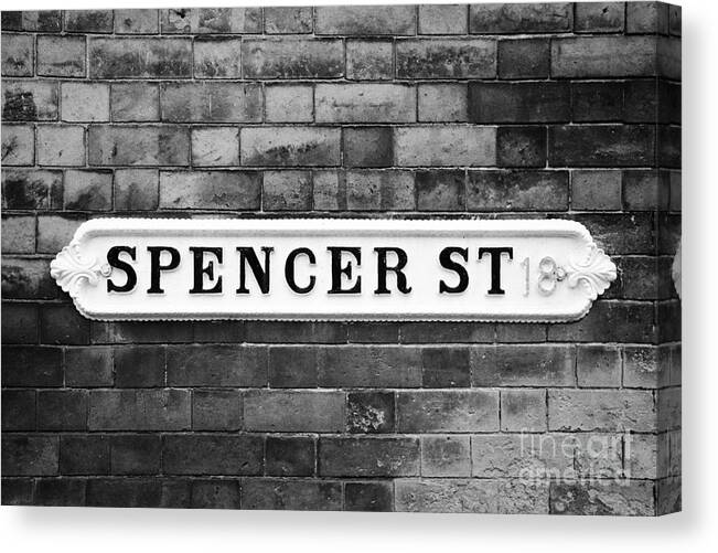 Victorian Canvas Print featuring the photograph Victorian Metal Street Sign For Spencer Street On Red Brick Building In The Jewellery Quarter by Joe Fox