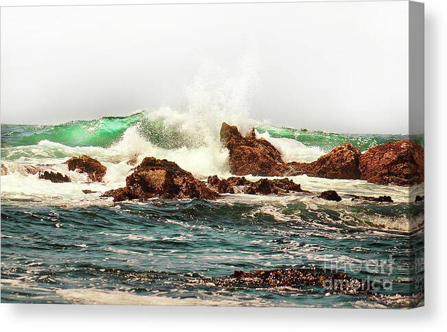 Waves Against The Rocks Canvas Print featuring the photograph Waves against the Rocks in Pacific Grove California by Artist and Photographer Laura Wrede