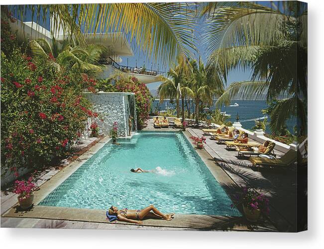 People Canvas Print featuring the photograph Pool At Las Hadas by Slim Aarons