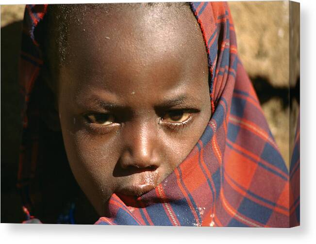 Africa Canvas Print featuring the photograph A Masai Child by Bonnie Colgan