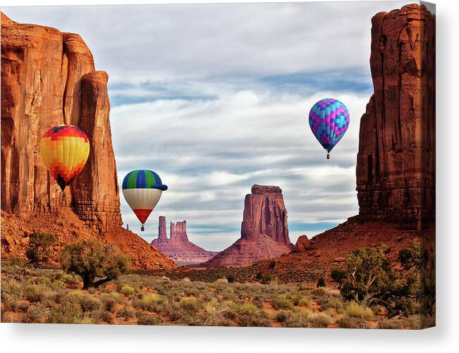 Arizona Canvas Print featuring the photograph Cruising The Monuments by Guy Schmickle