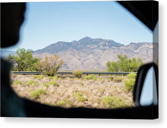 On The Go Canvas Print featuring the photograph Passenger by Jessica Yurinko